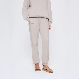 Beige cinched sweatpants made with organic cotton